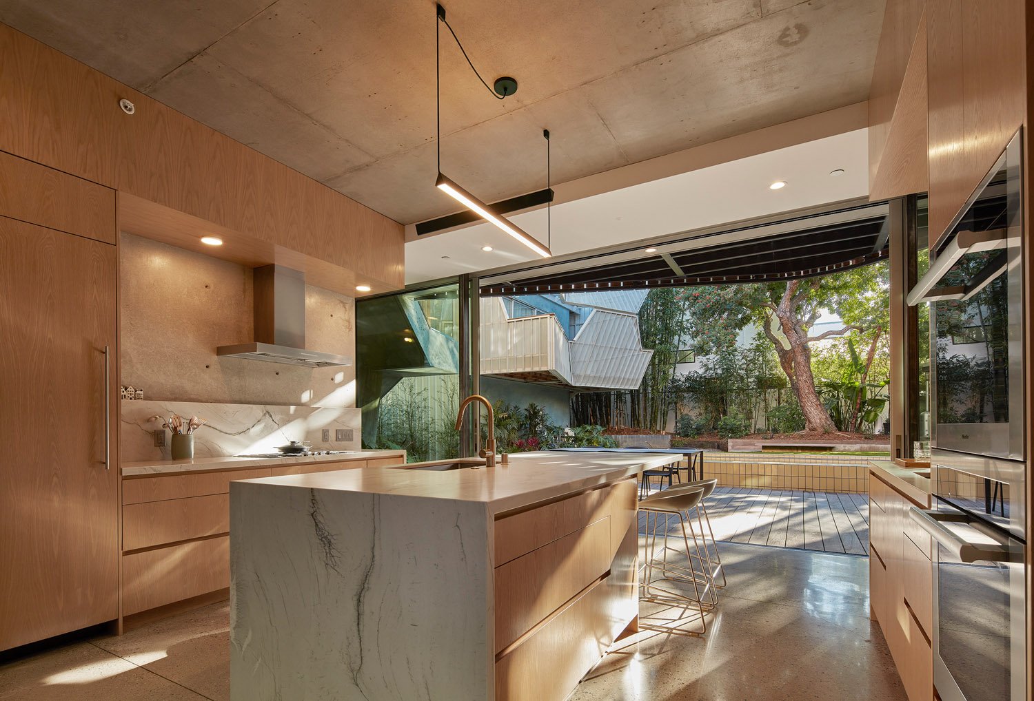 Palms II Kitchen with views through house | Benny Chan
