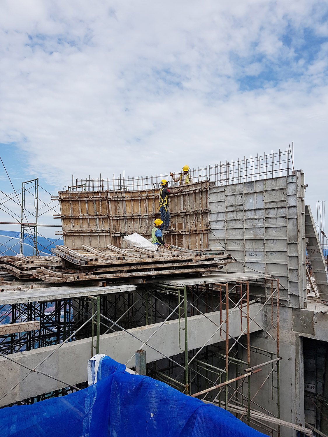 Workers were installing the formwork to cast the crown on top of the building | Architects 61