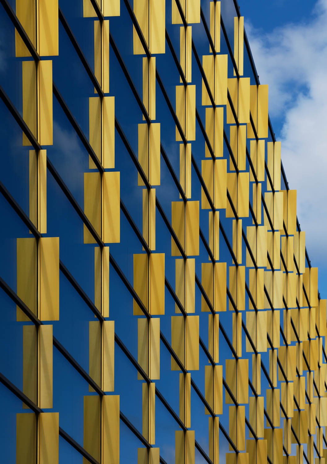 Gold shimmering glass facade | 