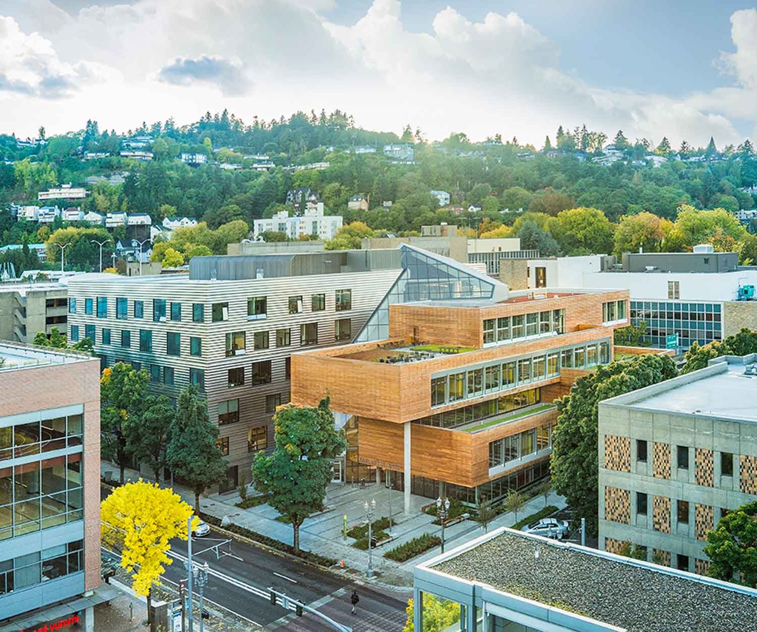 Sited at the midpoint between the Portland West Hills and the Willamette River. The Montgomery Green Street, in front of the Karl Miller Center will connect many key urban spaces within the city. | Janis Rozkalns