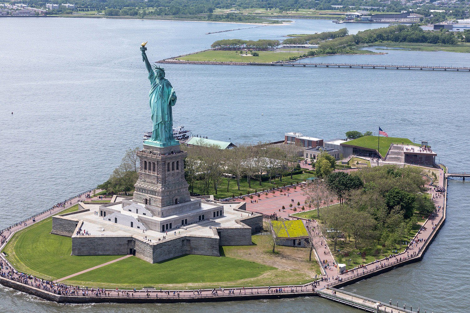 The museum and the Statue of Liberty—located on opposite ends of Liberty Island. | Copyright Iwan Baan