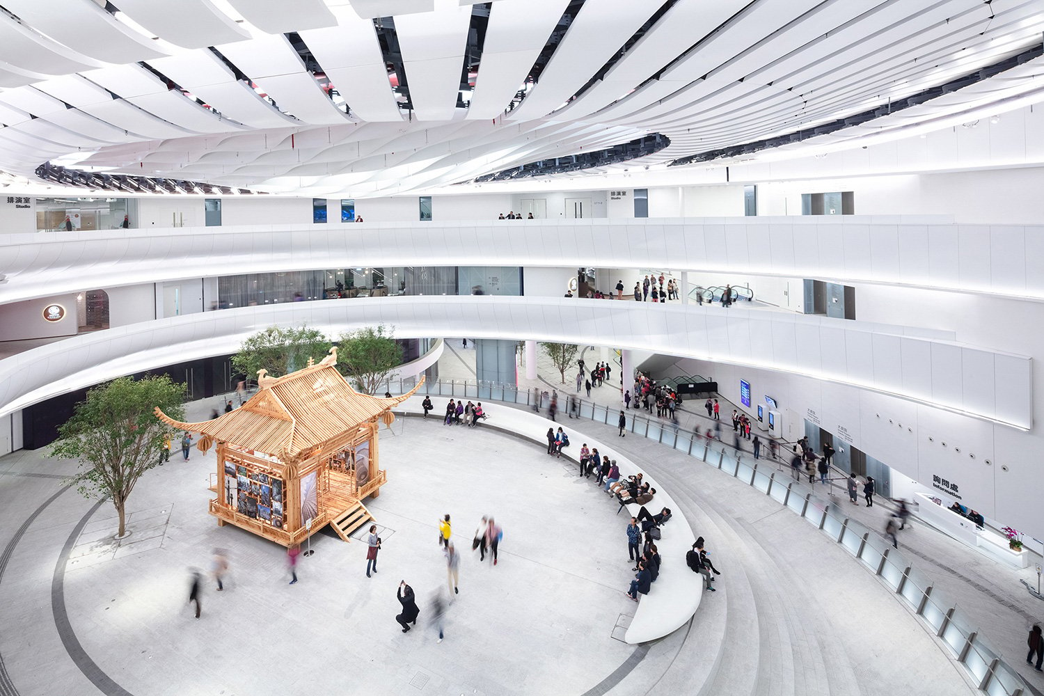 Xiqu Centre’s Main Auditorium is suspended 27m above the ground, creating a spacious and bright atrium and open public plaza beneath | Ema Peter - Ema Peter Photography: www.emapeter.com