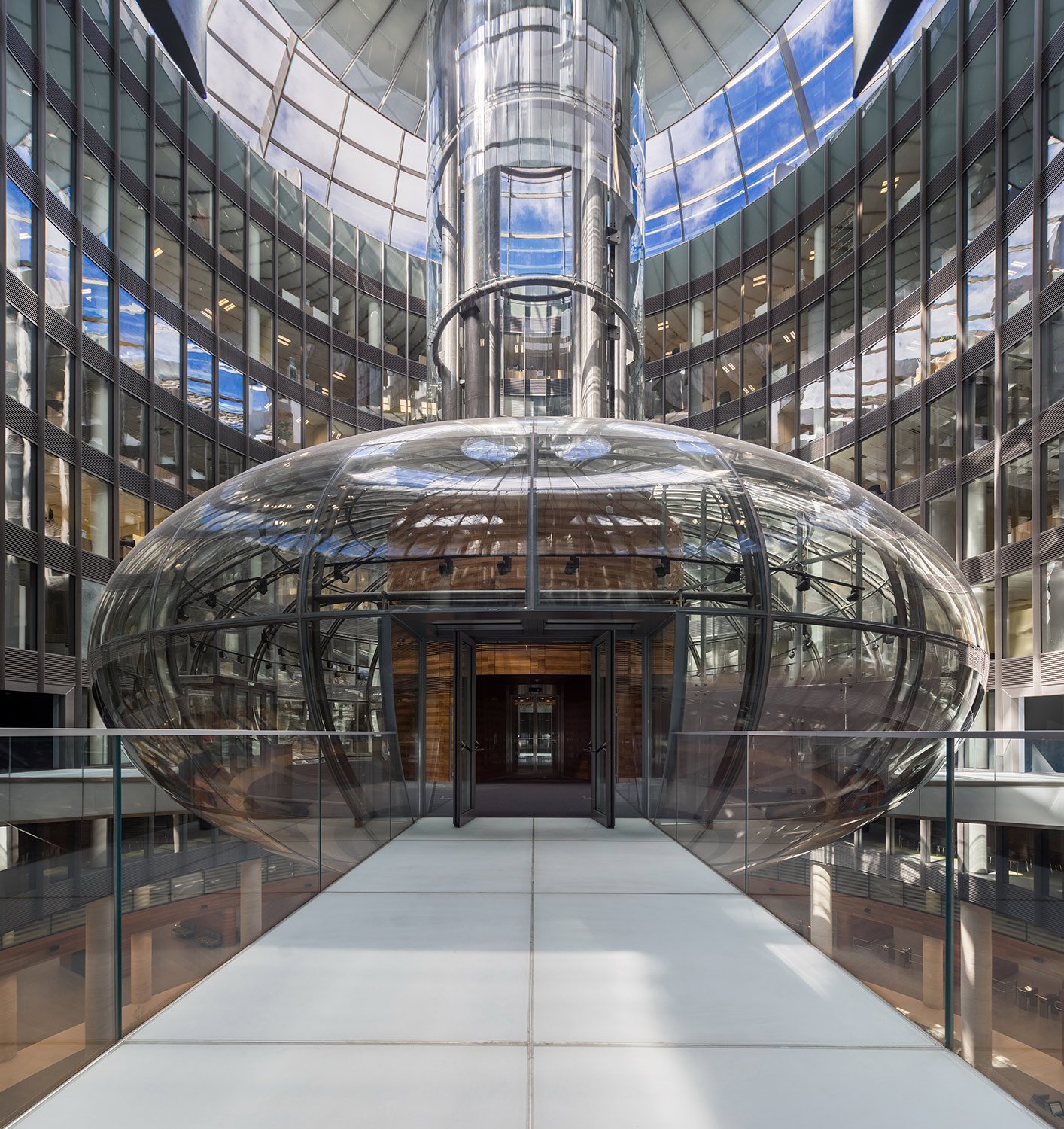 Cylindrical inner court yard and the lens-shaped futuristic glass dome, Nevsky Town Hall, Saint Petersburg | Andrey Belimov-Guschin