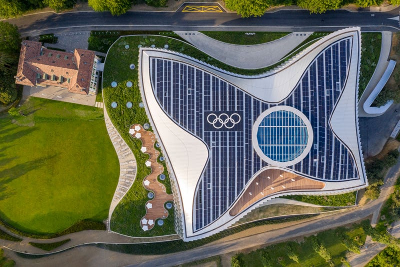 The building respectfully integrates into the surrounding historical park setting. | © 2019 / International Olympic Committee (IOC) / 3XN / IttenBrechbühl / MØRK, Adam - All rights reserved.