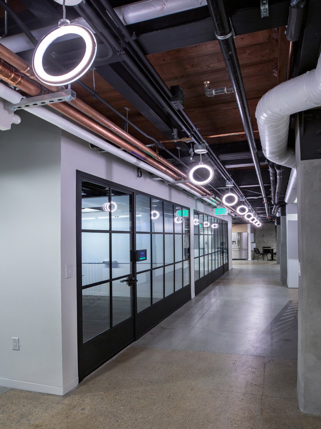 Throughout the building, the architectural lighting design with new lighting fixtures and other interventions are instrumental in transforming the interior from an electrical powerhouse to a humane and upl | Billy Hustace