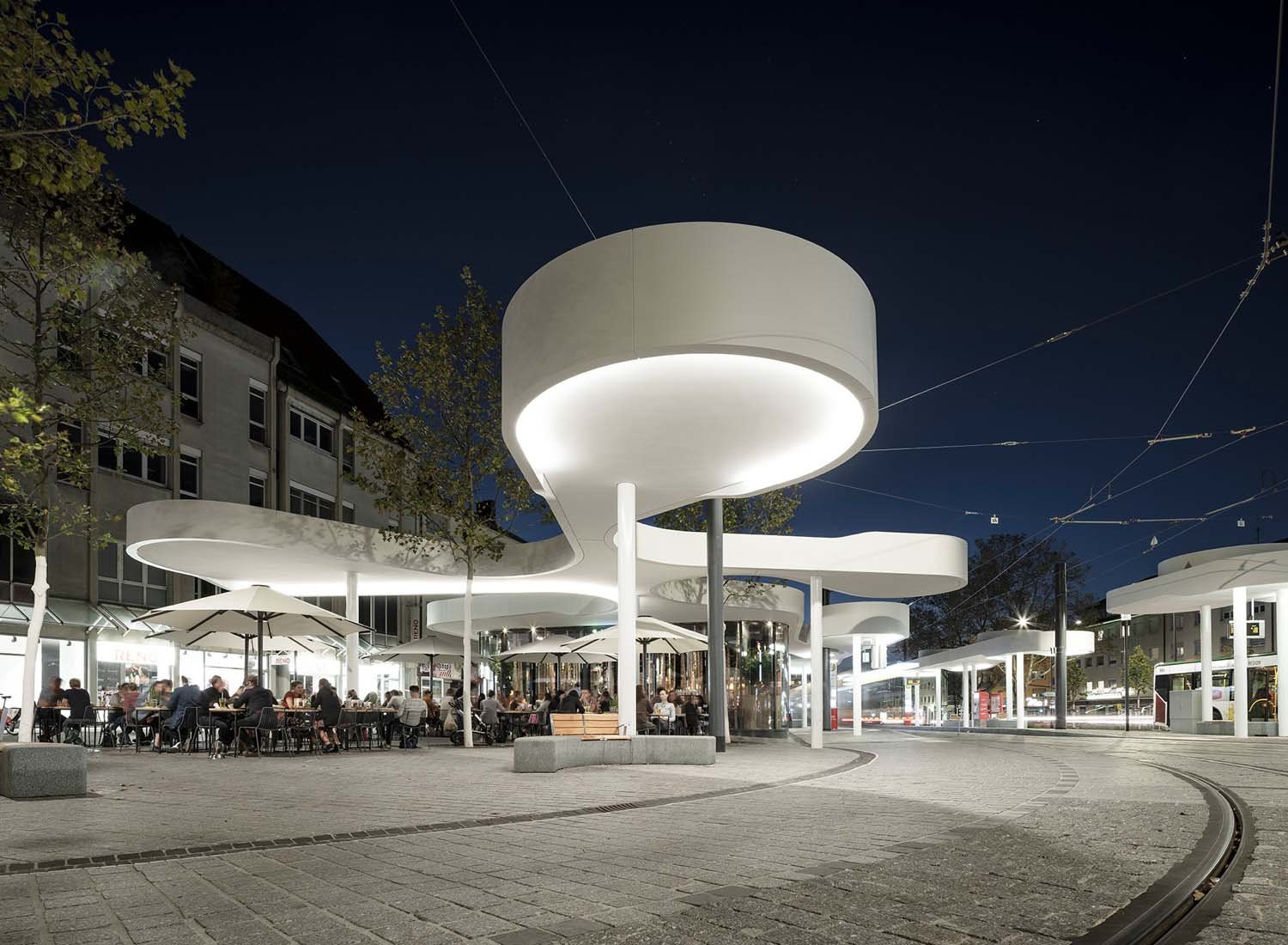 Perspective from East with Restaurant Use at Nighttime with Lighting | David Franck