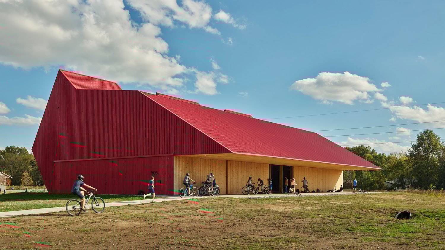 view of the northwest corner; the deep porch on the west serves as a covered seating area to watch soccer games | Timothy Hursley