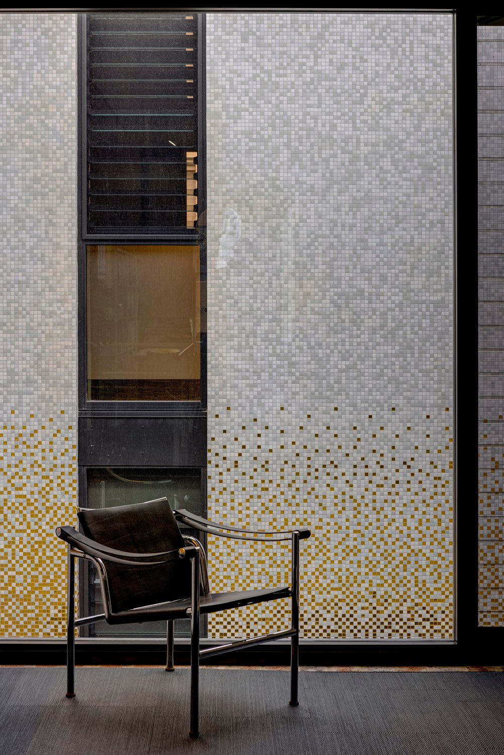 Office with golden facade behind | Brett Boardman