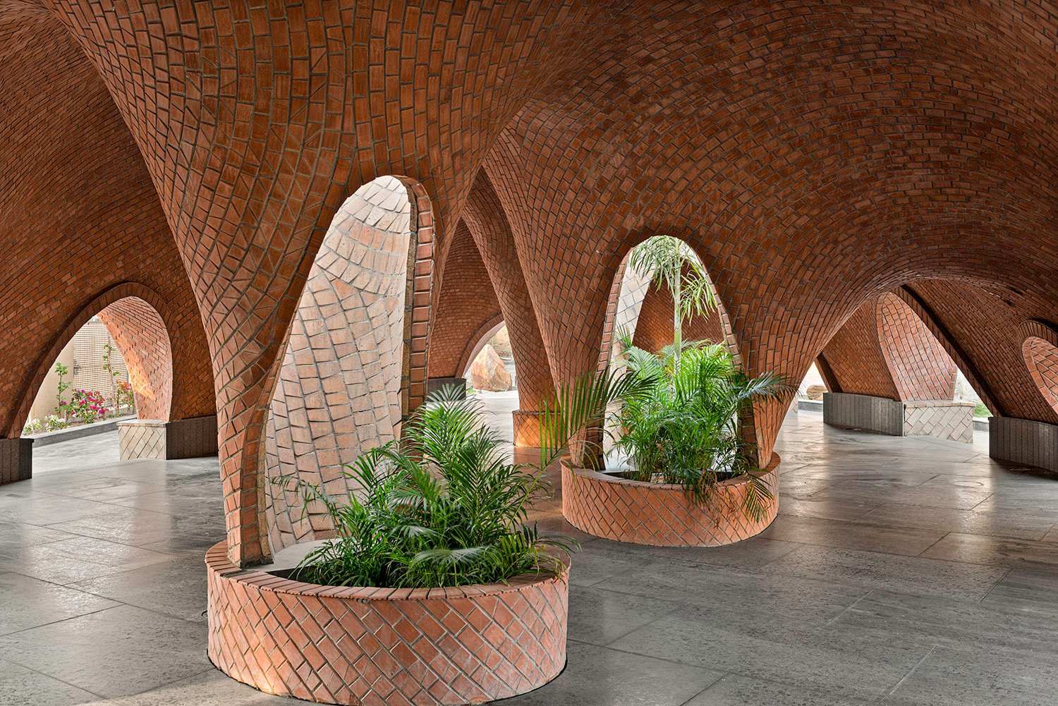 An evolving emotional odyssey, narrating introverted desire for connection. Terracotta material transfers feeling, while light and shadow animate interiors, crafting distinct pockets of diffuse illumination, evoking a tangible and captivating story. | PHX India