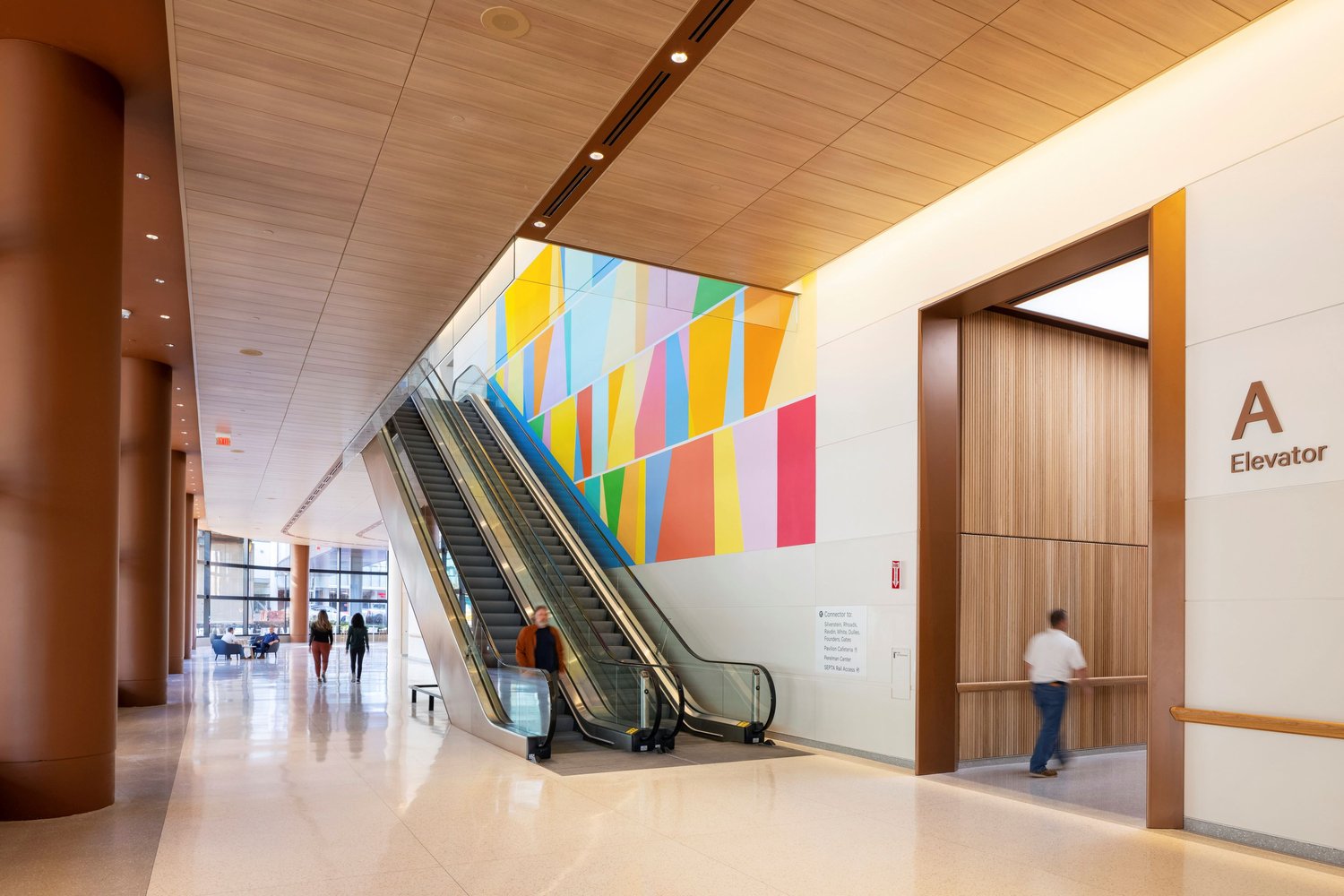 Interior view of the Pavilion at the Hospital of the University of Pennsylvania showcasing a major mural by Odili Donald Odita. | Dan Schwalm / Foster + Partners