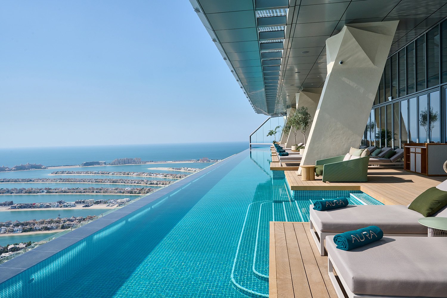outdoor deck approaching into the pool | AURA SKYPOOL Dubai, Juliet Dunne