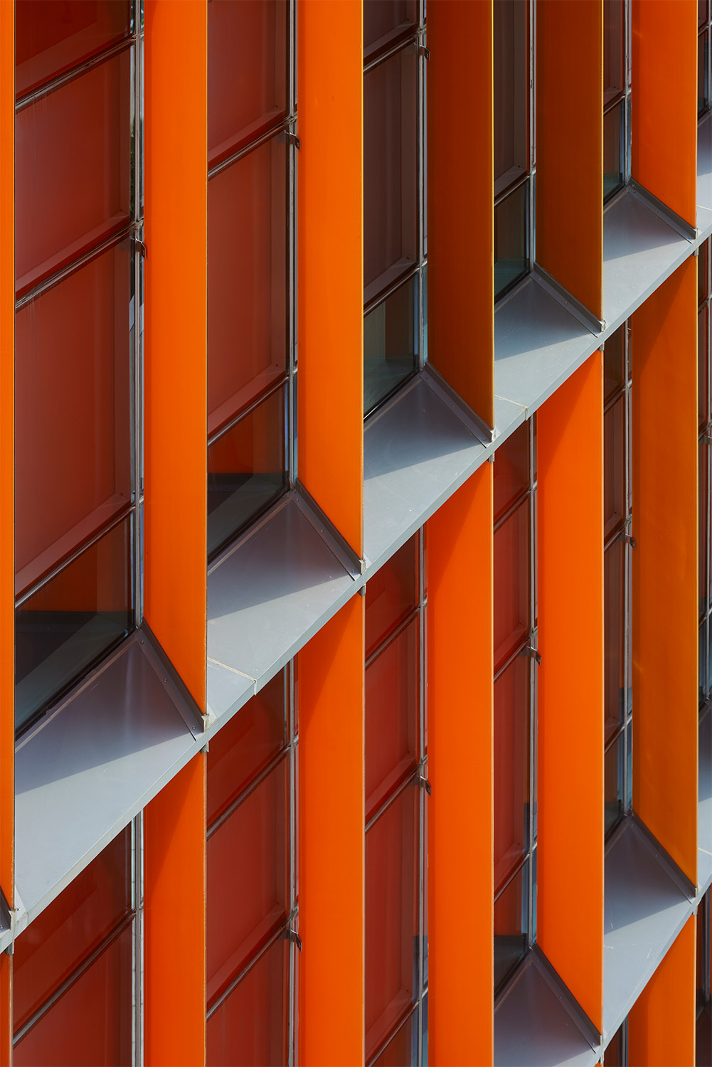 Complementing the building's form, these facade fins at varying angles reduce heat gain | Paul Raftery
