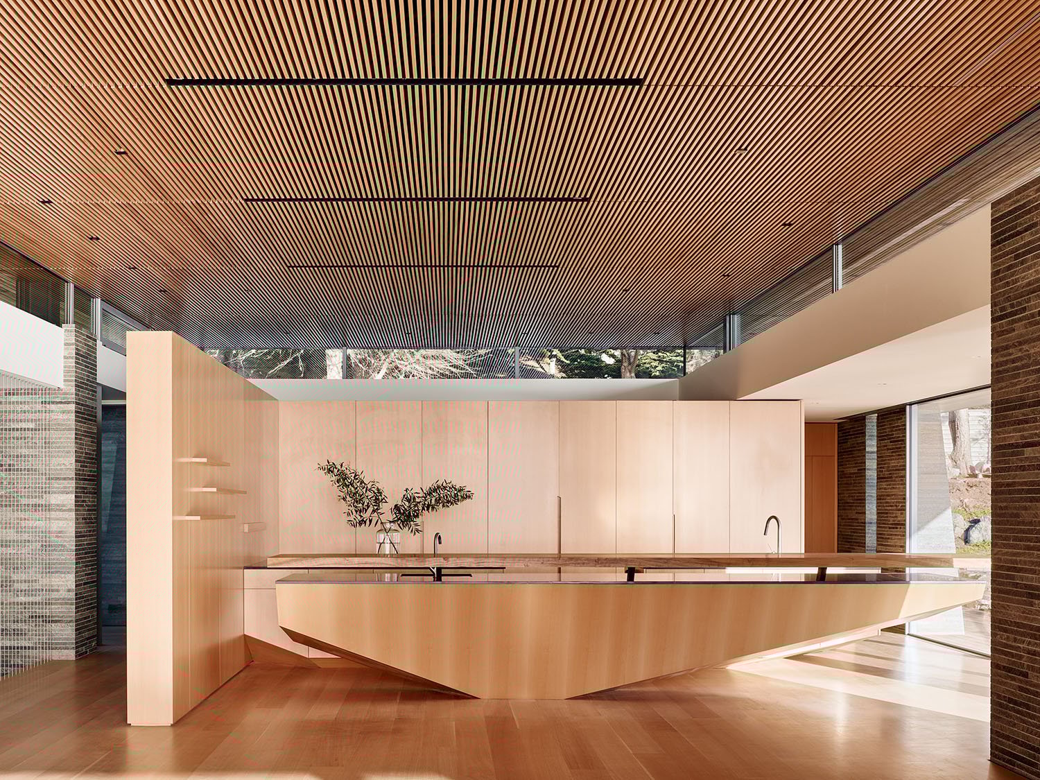 The kitchen and custom-designed sculpted island. | Joe Fletcher