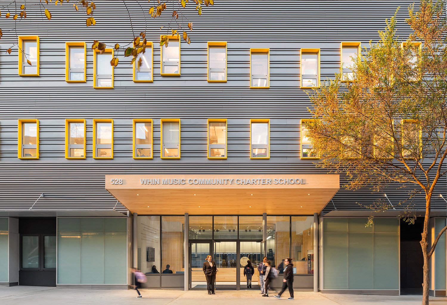 WHIN’s architecture invites the community to engage and take part in the school’s purpose. | © Here and Now Agency