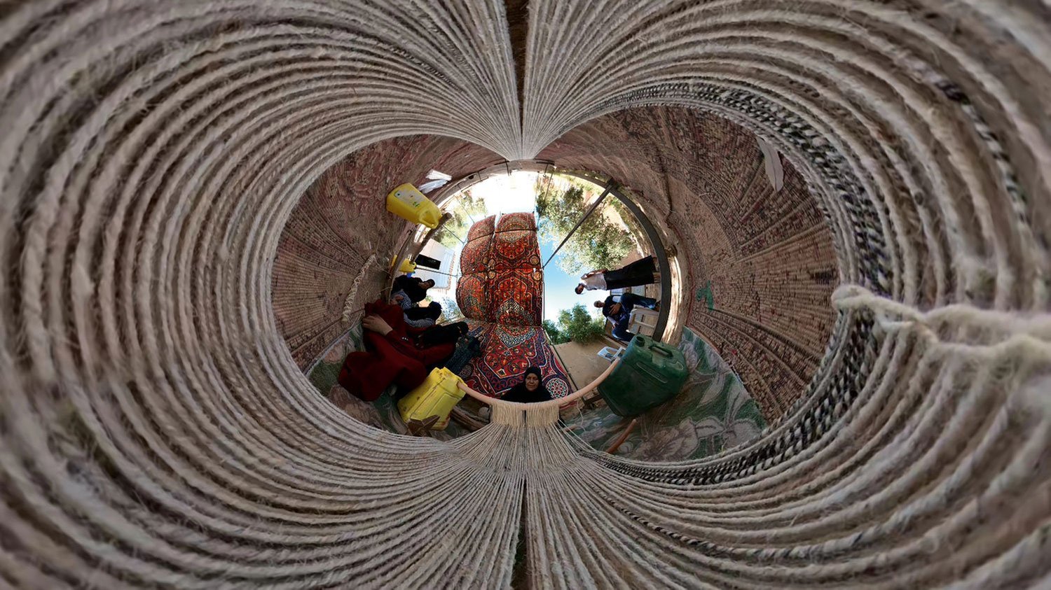 Reviving the Culture of Weaving as a Modus Operandi | A “little planet” image weaves the surroundings and components of my nomadic handwoven tent installation, a conduit for experiential education. © Amr Toukhy, 2022