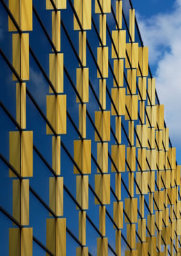 Gold shimmering glass facade | 