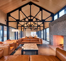 The polished concrete floor is contrasted by the white ash plywood ceiling | doublespace photography inc