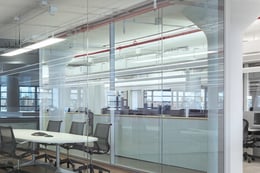 Glass partitions between conference rooms and open office | Michael Moran