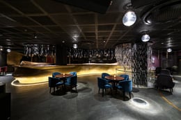 Light installation above the bar is an interpretation of sheets of rain pouring down. | ©Photographix | Sebastian + Ira