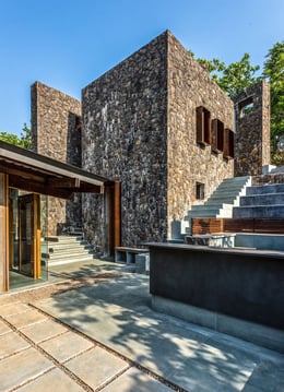 The Outdoor cooking area in the West. The utility spaces are contained within the Stone Tower | Bharath Ramamrutham