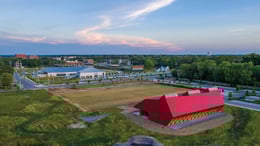 overview of the bike barn from the southeast corner above the pump track looking back to the campus | Timothy Hursley