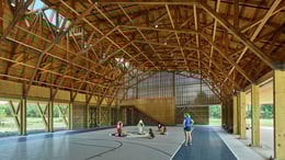 view of the sports court and mezzanine stair beyond | Timothy Hursley