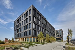 The public plaza on the south side of the Catalyst Building connects the Gateway Bridge to the building entrance. | Benjamin Benschneider