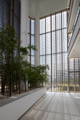 Landscape in the atrium provides a green sanctuary while reducing heat built up within the building. | Photography by Albert Lim K.S.