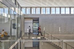 The open-air, three-story commons connects student areas and faculty offices to the laboratory spaces, capturing traffic flow. | Photo © Bruce Damonte