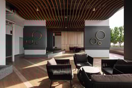 Reading deck with wavy ceiling panels mimicking the same language as the façade. | David Yeow