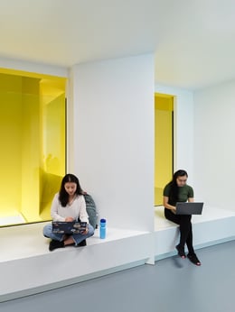 Visible Sustainability: A newly created light and air shaft (painted a vibrant yellow) acts as the primary return air path for the building. The shaft allows natural stack effect to assist air flow to rooftop heat recovery units, reducing fan energy loads | Andrew Latreille Photography