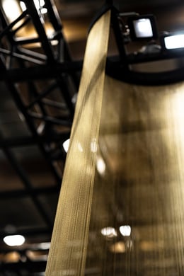 Rays of light falling along nylon threads_01 | NIKKEN SPACE DESIGN