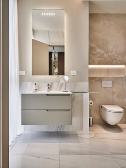 With its meticulous attention to fine finishes and the soothing hues employed, this bathroom gracefully extends a warm invitation, immediately enveloping its guests in a sumptuous haven dedicated to personal well-being and the nurturing of their overall w | Matteo Imbriani