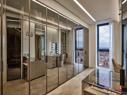An artfully tailored space devoted not only to housing the clients' wardrobe but also to embracing and indulging in every treasured moment dedicated to self-care and pursuing their passions. | Matteo Imbriani