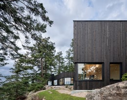 New building envelope science was applied to solve issues the original house faced from constant wind driven rain up the cliff it sits on | Ema Peter