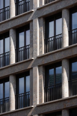 The grey natural stone façade of house 43. | Ilya Ivanov