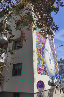 Side Building n.47 with a murales by Hunto | Elisa Ducoli