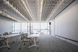Seminar Room : A minimalist, modern seminar room with unique acoustic ceiling treatments and panoramic windows for an enlightened learning environment. | © Spaceshift Studio