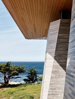 Thin stone coursing of the walls and a thin roof edge compliment a view of the Pacific horizon. | Joe Fletcher
