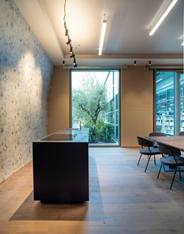 © Fabio Oggero courtesy ACC Naturale Architettura e Negozio Blu Architetti Associati | Man-made lighting creates a dialogue with natural light as an integral part of the architectural approach, flooding the interior spaces through large windows that also offer outside views.
