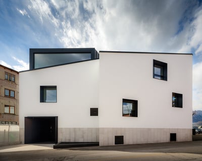 Farmacia Riva, the restoration of a mixed use building in the North of Italy